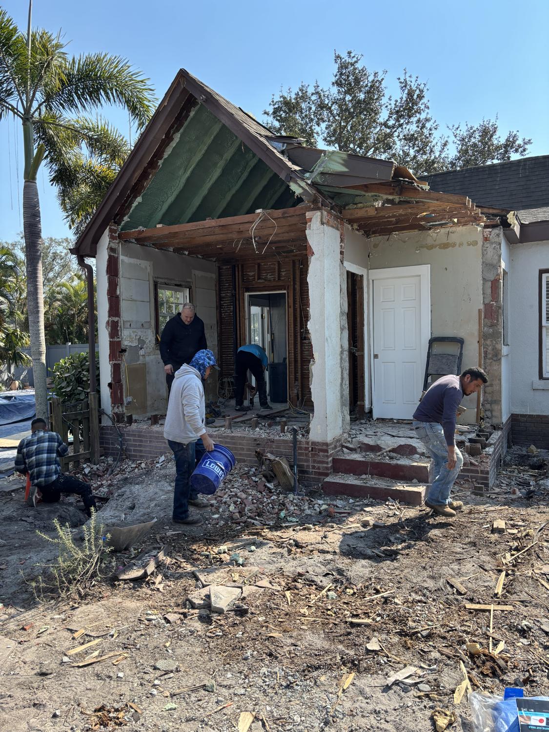 Exterior house structure demolition in progress in St. Petersburg
